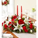 Oval arrangement of Lillies ,Roses & Carnation with Candles