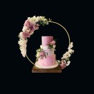 Pink Floral Elegance: A Breathtaking 3-Tier Cake with a Stunning Flower Ring Design