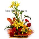 Red Carnation Arrangement mixed with Yellow Lillies